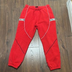 Jordan Red Track Pants with White Trim and Elastic Cuffs
